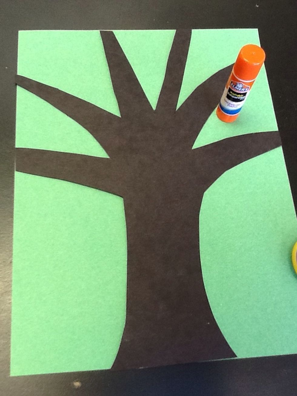 Glue onto another piece of paper - any color, but not black.