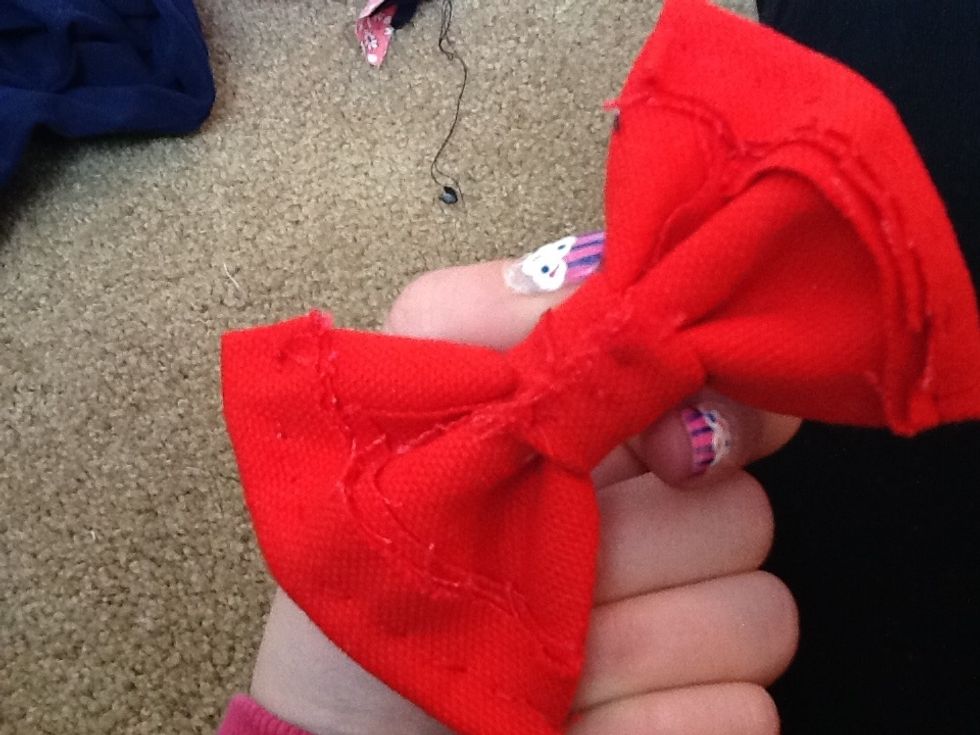 Glue or sew it together in the back