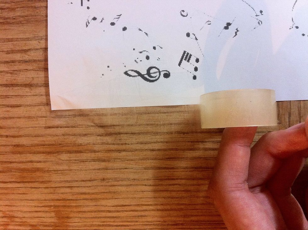 Glue or tape one side of the paper.