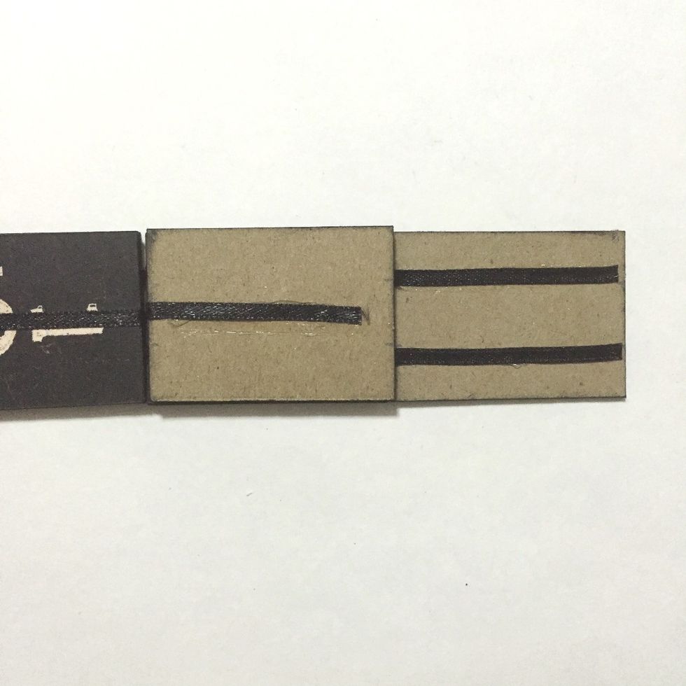 Glue over the center ribbon onto the 12th number block as shown... Trim the ribbon when necessary to fit...