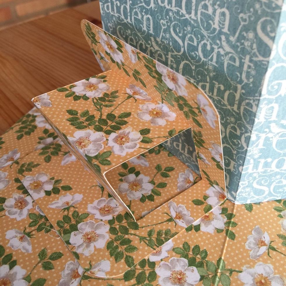 Glue pieces to make the pop-up elements.