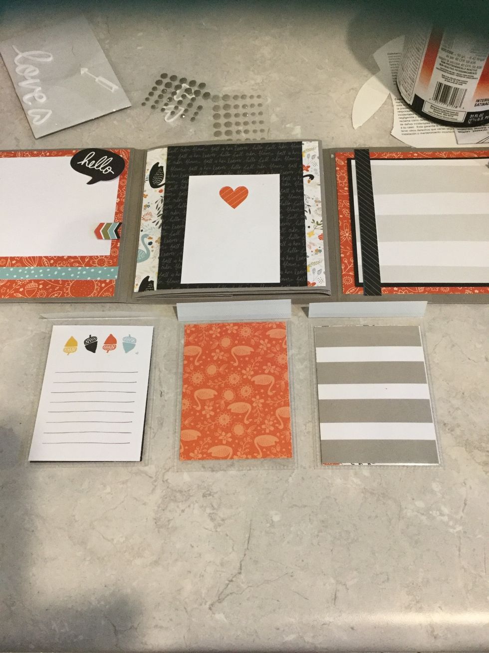 Glue red heart card near bottom. All flip flaps have two cards in them except the red floral. It is same design on both side