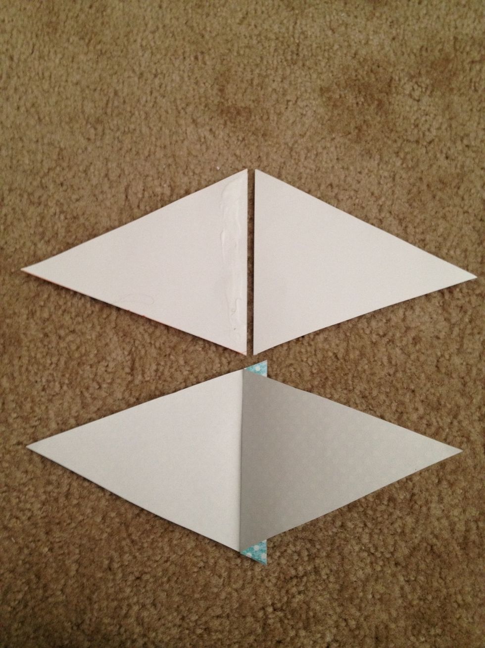 Glue separated edges of extra triangle from earlier step. It will look like the bottom triangle. Glue string to that crease.