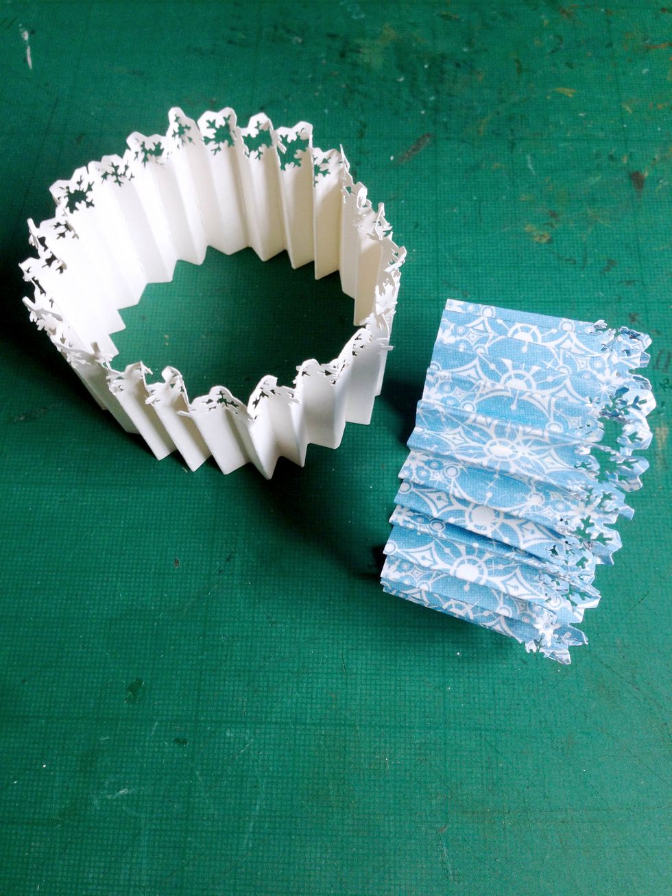 Glue the 2 ends together as shown... These will be the rosettes skirts for the fairy...