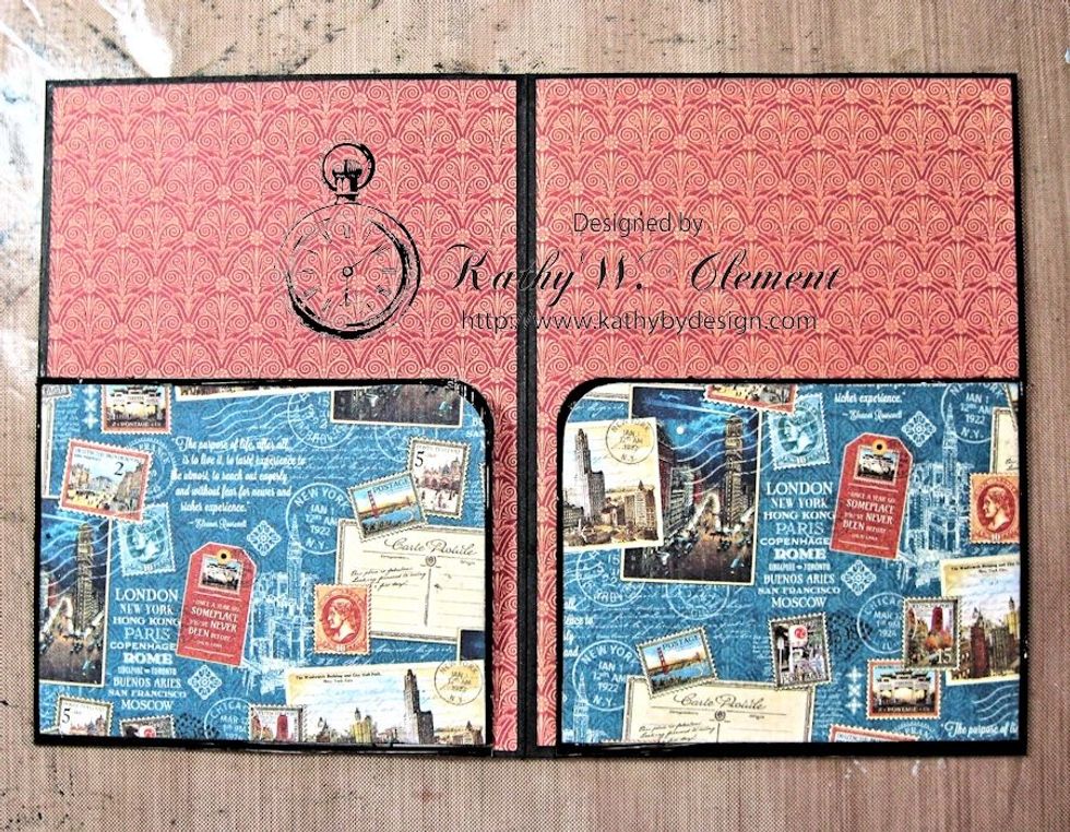 Glue the back of the 1st folder to the front of the 2nd folder. Use a thin bead of glue along the crease, top and bottom only, leaving a pocket for photo mounts. Line the interior of each folder.