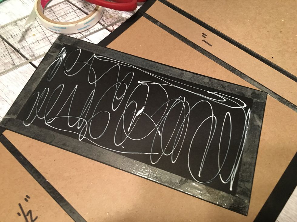 Glue the back of the binder