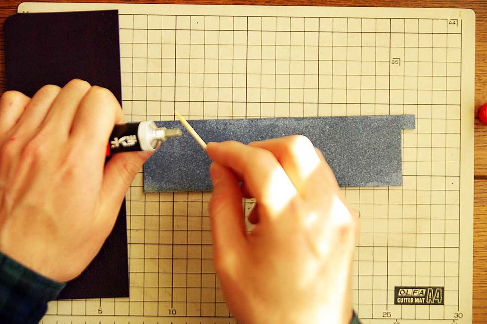 Glue the belt together using elastomeric adhesive which is used to glue leather.