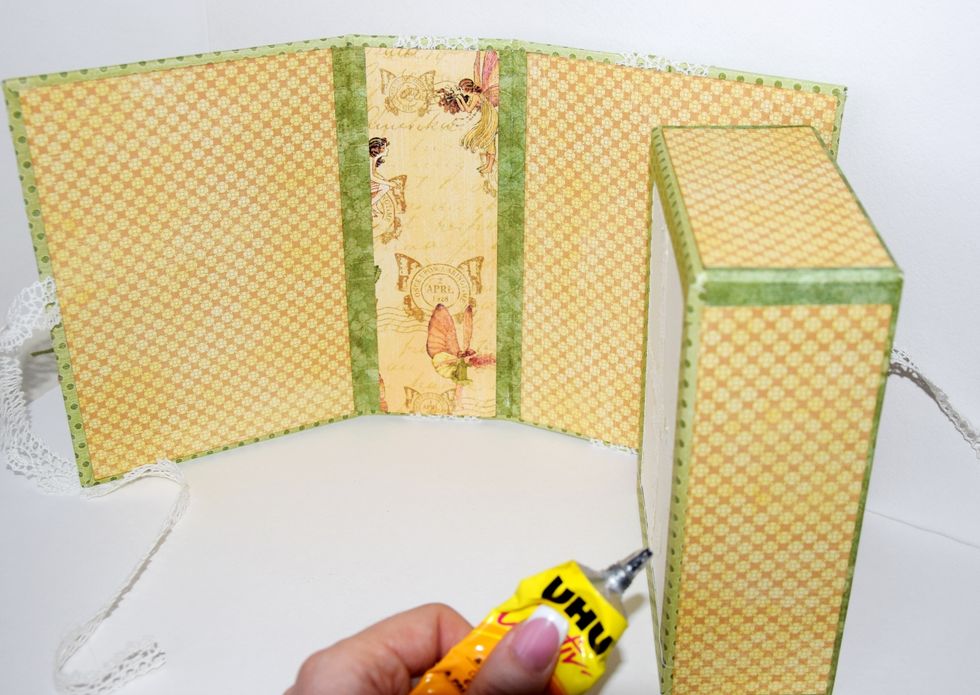 Glue the box to the cover. Let it dry