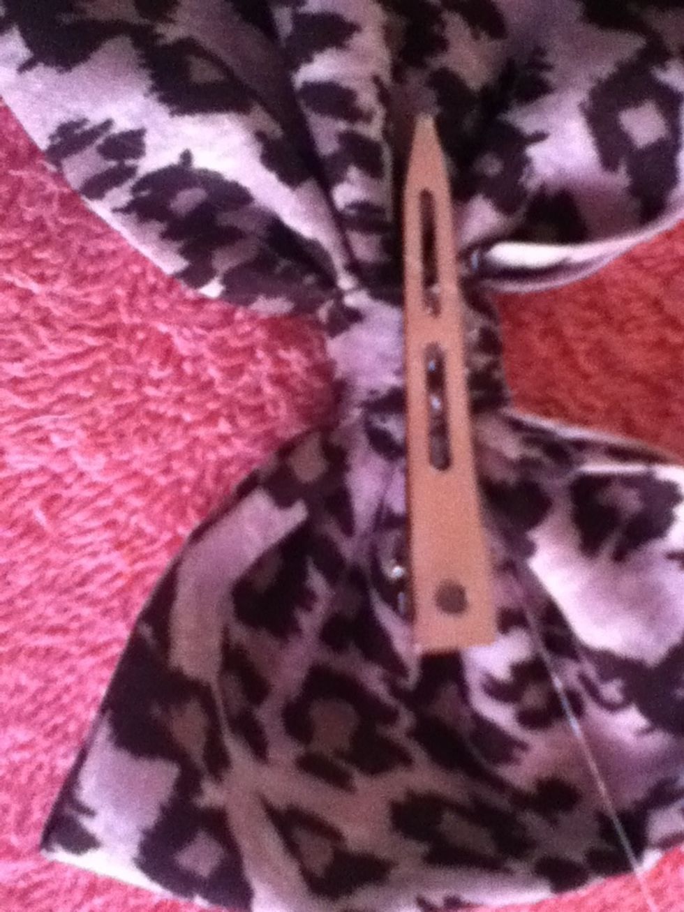 Glue the clip on the middle of the bow.