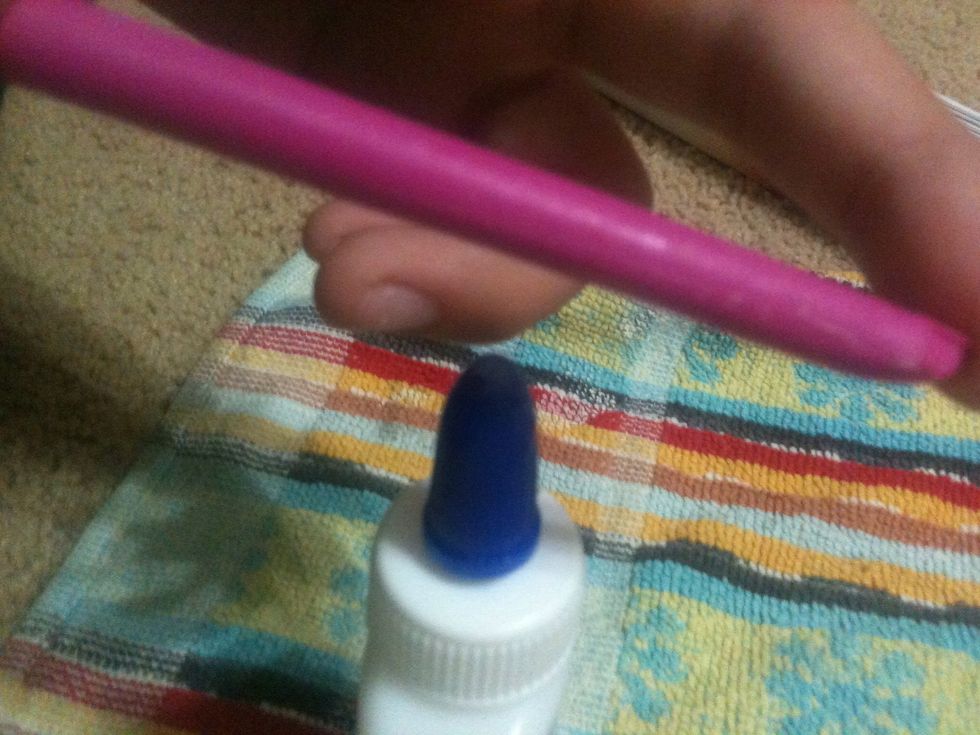 Glue the crayons on and stick them to the canvas