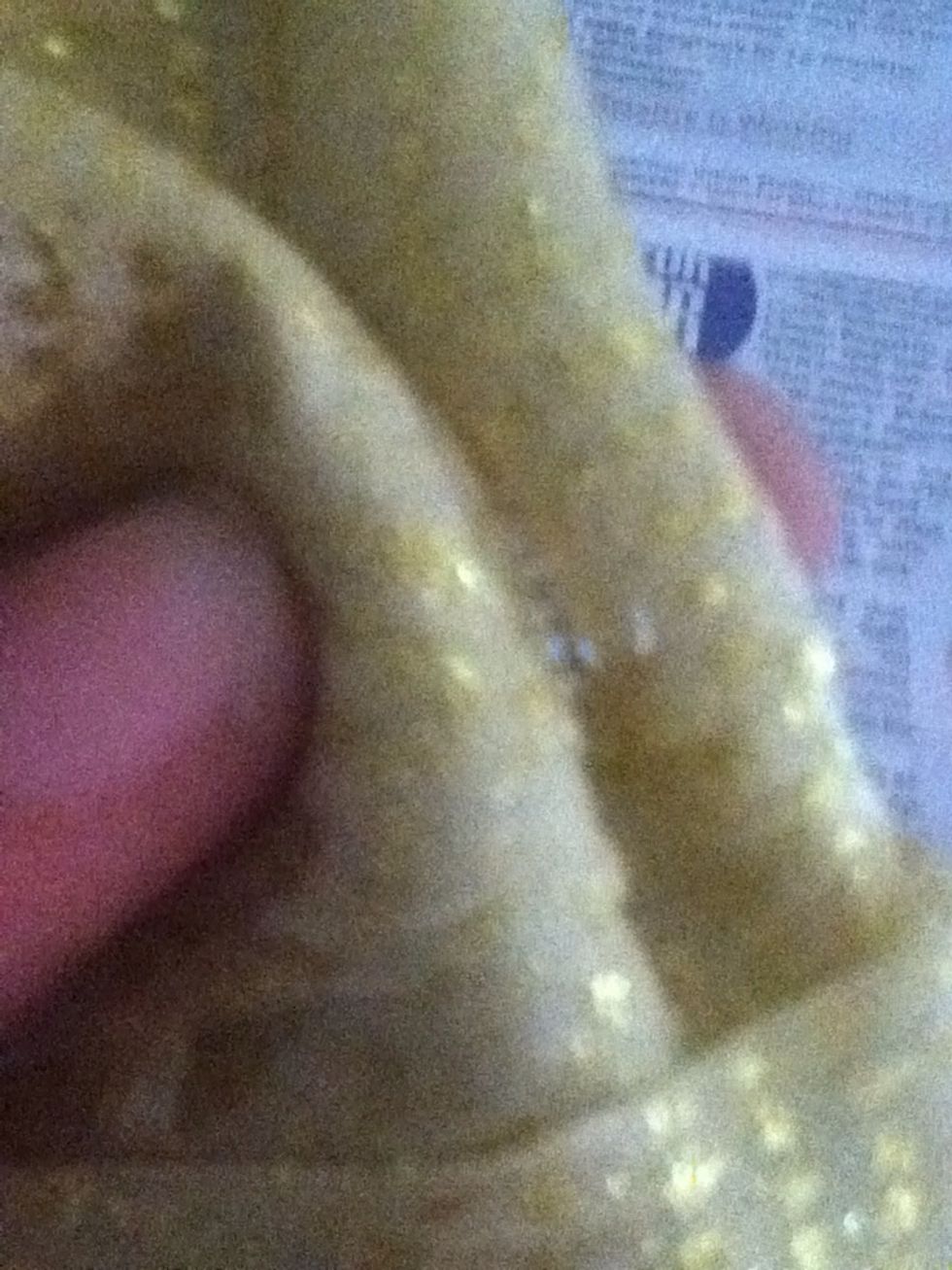 Glue the creases to shape your bow .