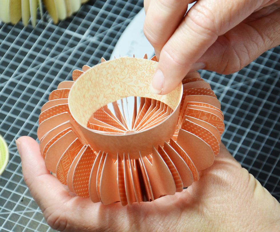 Glue the ends of the inside roof lining together to create a circle as shown then attach to the inside of the roof cut out.