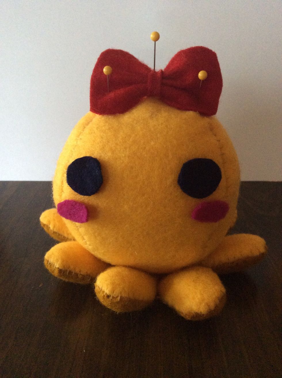 Glue the features down and pin them if necessary.