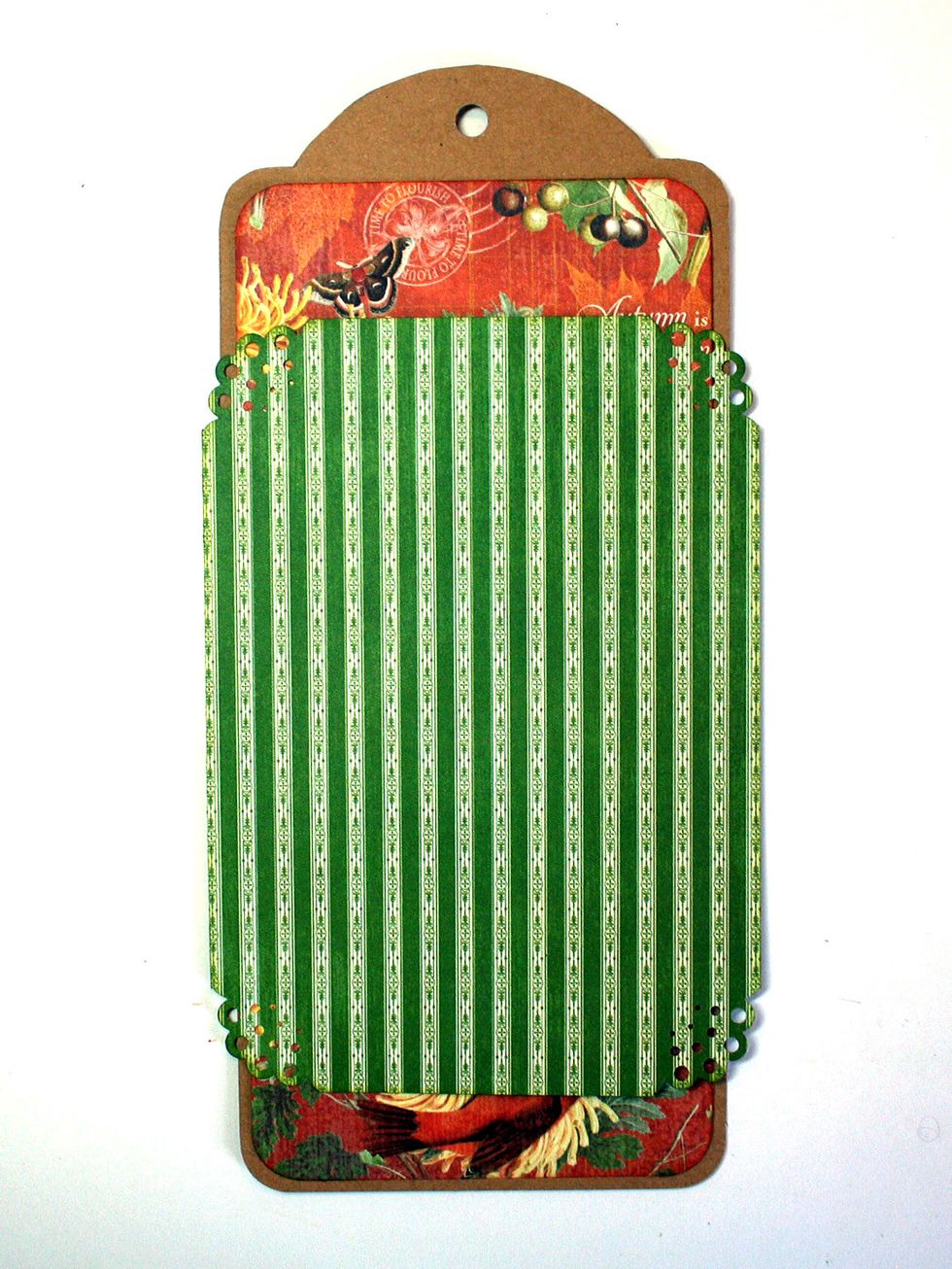Glue the green striped piece onto the tag as shown about 2" from the top.