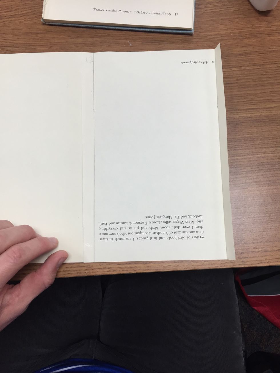 Glue the last page. This page is the page with two folded flaps.