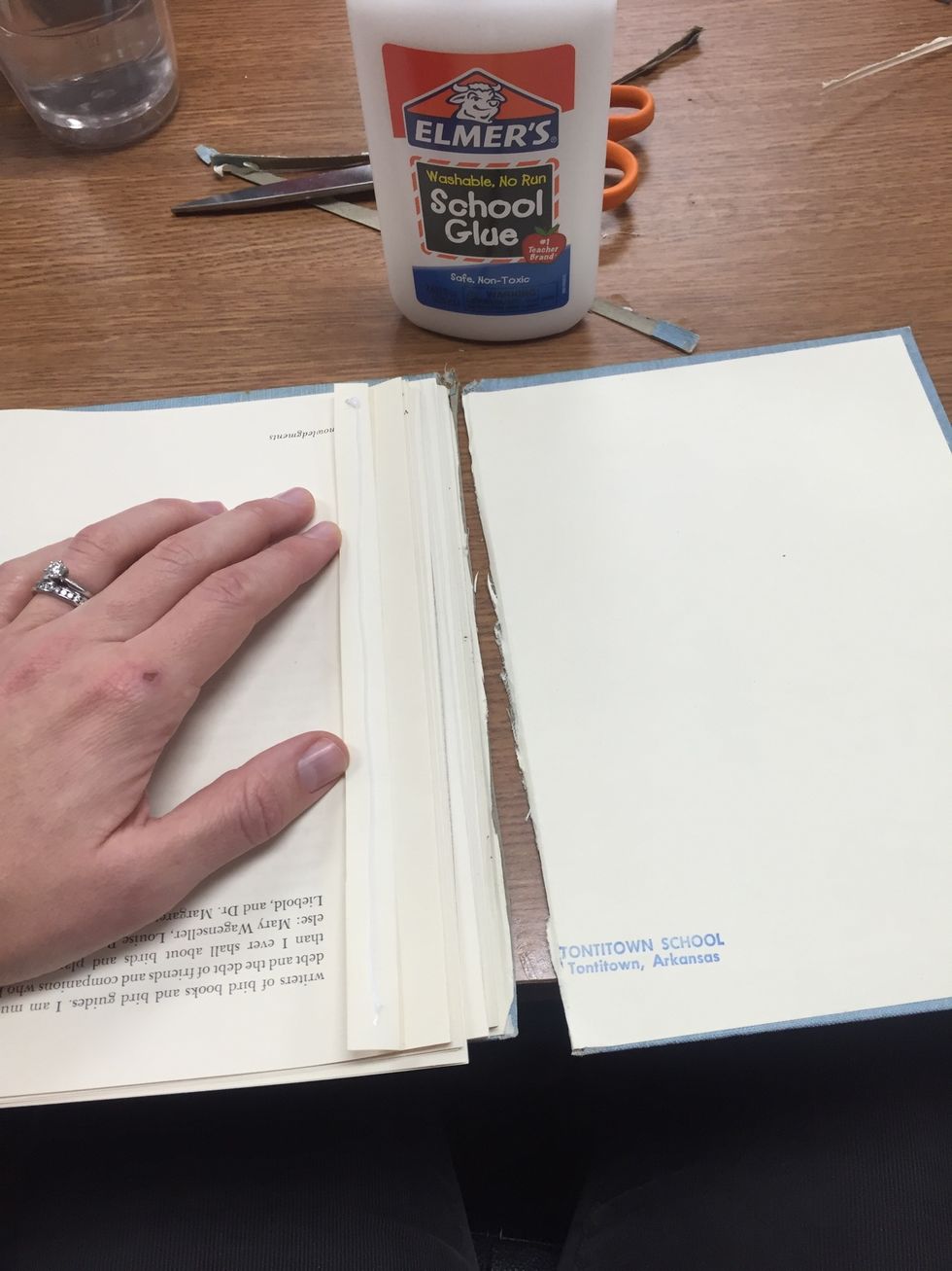 Glue the last page to the back cover.