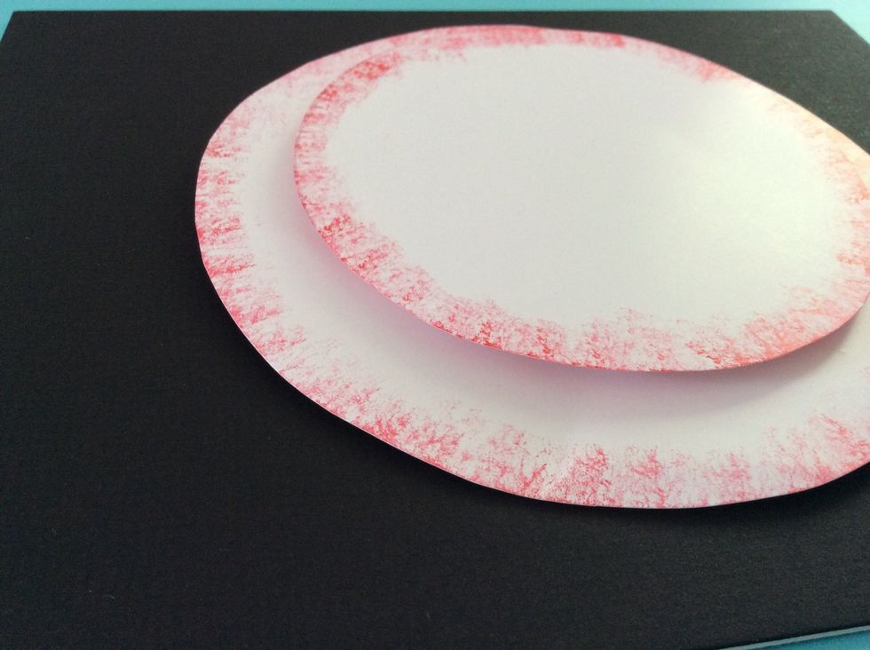 Glue the next smallest posterboard that was stamped on top of this foam board. This side angle view shows how the snowman is starting to look 3-D.