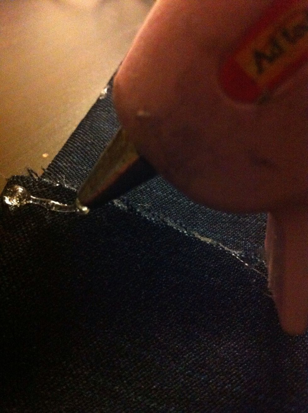 Glue the overlapping space and make sure it's completely cooled before moving on