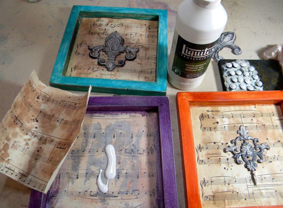 Glue the paper to the background with matte medium.
