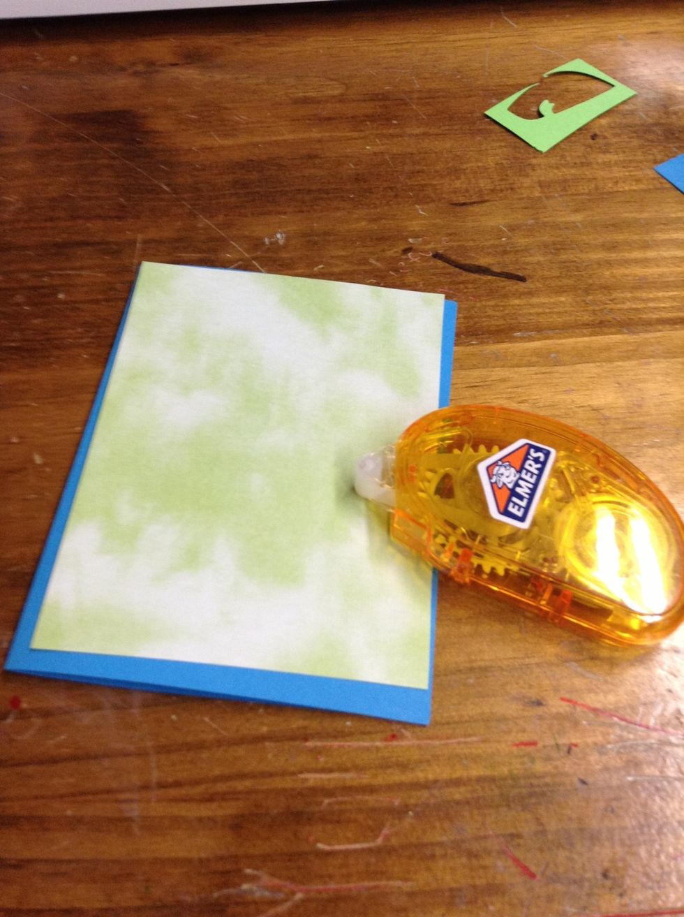 Glue the patterned paper layer (4" by 5 1/4") onto the card