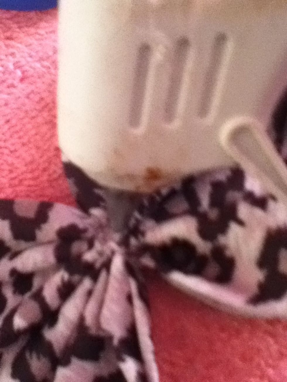 Glue the piece of fabric down.