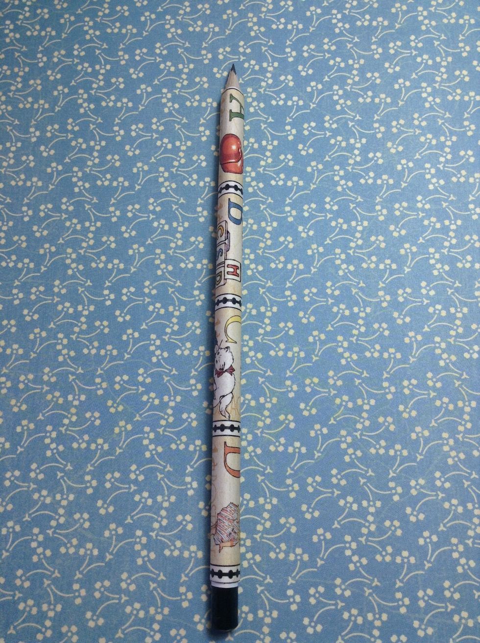 Glue the right edge overlapping the left to finish off the pencil.