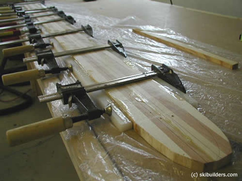 Glue the sidewall material to the laminated wood and clamp it tight