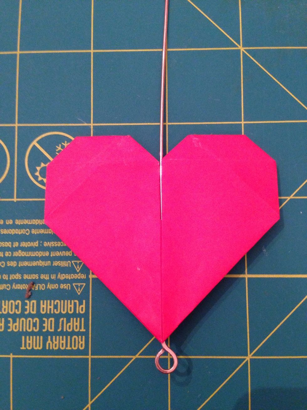 Glue the top down, sandwiching the wire between the layers to hold it in place. Glue the rest of the heart together too.