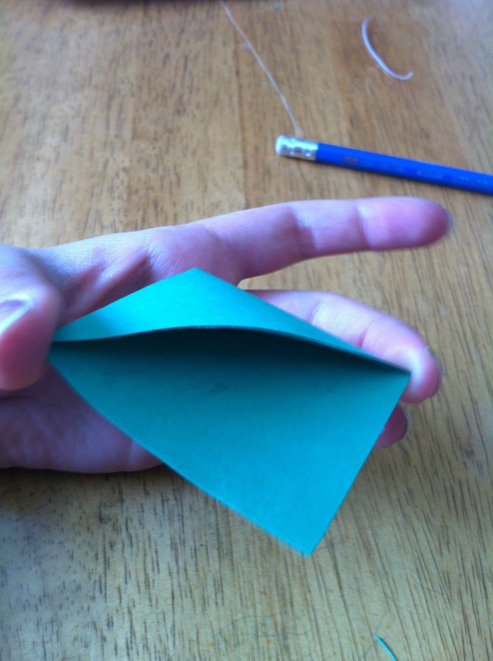 Glue the top slip on to the bottom slip. Do not glue the slips to the shape. That is where the paper will go.