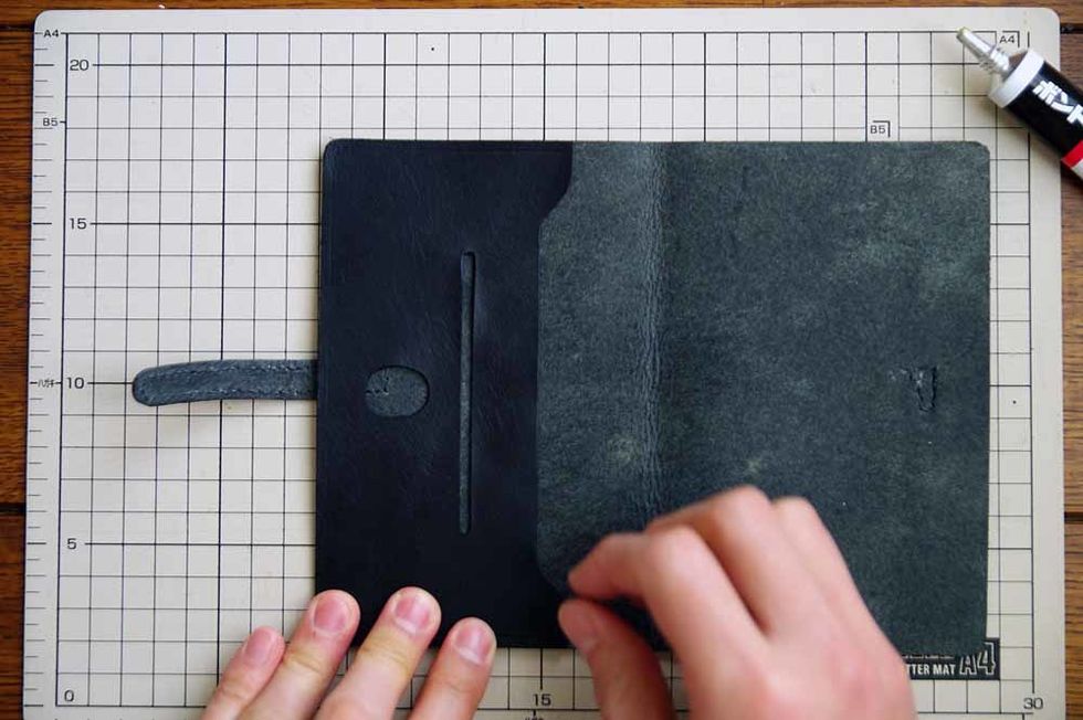Glue the two inside pockets onto the inside of the leather.