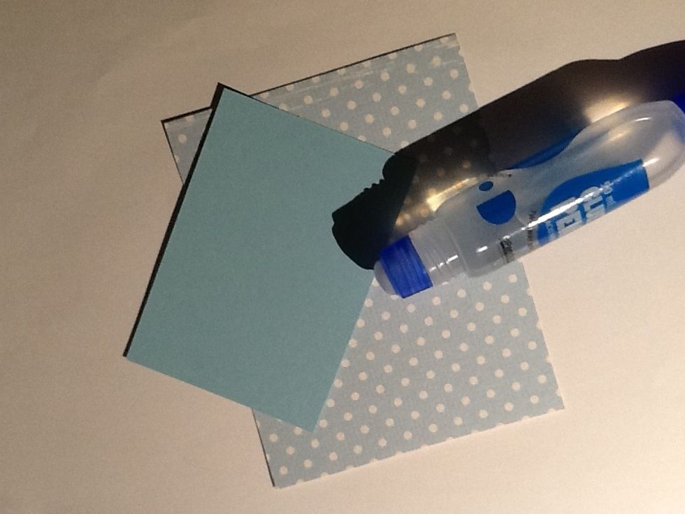 Glue the two papers together.