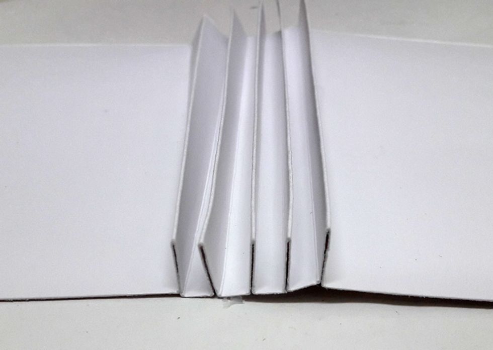 Glue the two sides of each pyramid together.