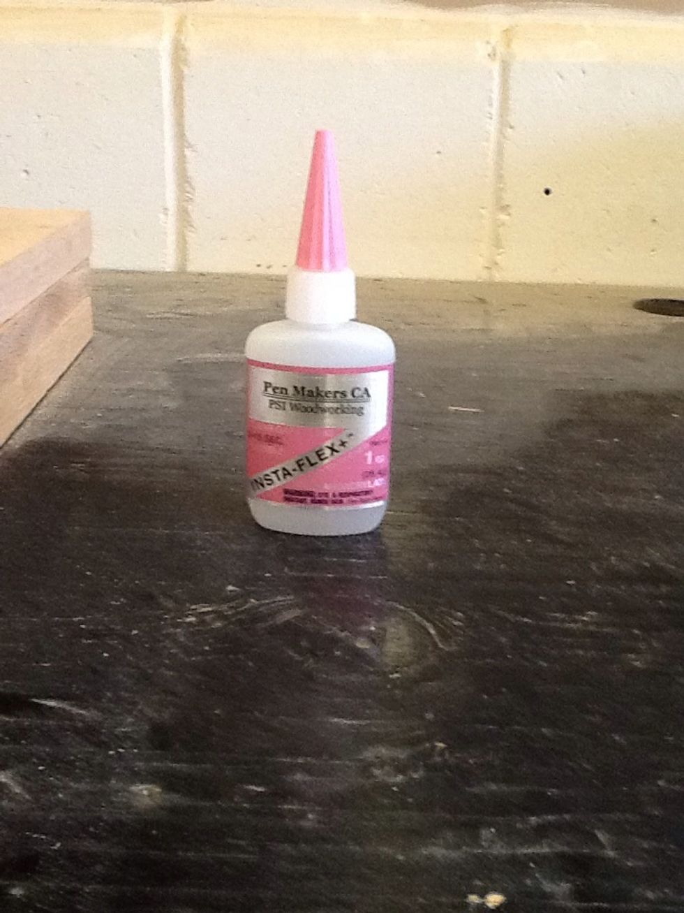 Glue the wooden blanks over the brass tubes (it will dry rather fast, do not apply to skin)