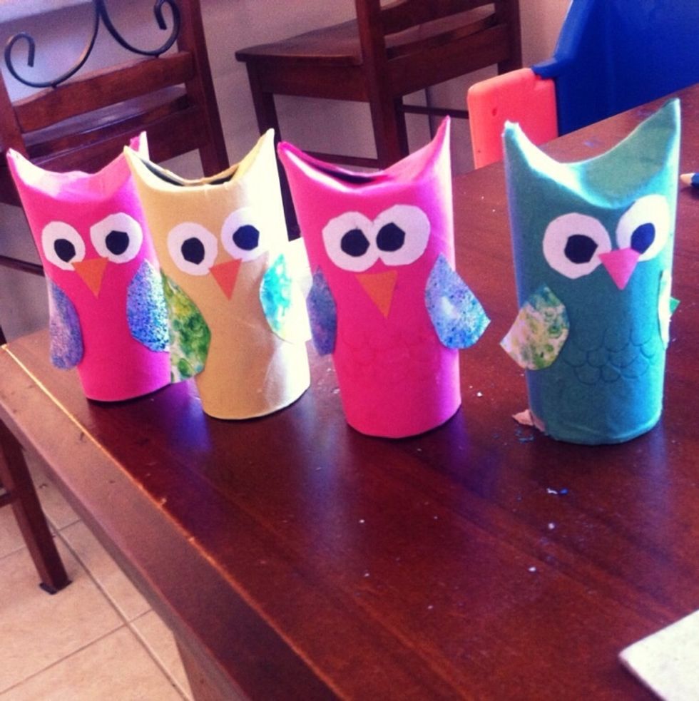 Glue them on like this.. I left some of the wing without glue so it went off the role a bit but you can change to shape and size of the eyes and wings if you want doesnt have to be exact :)