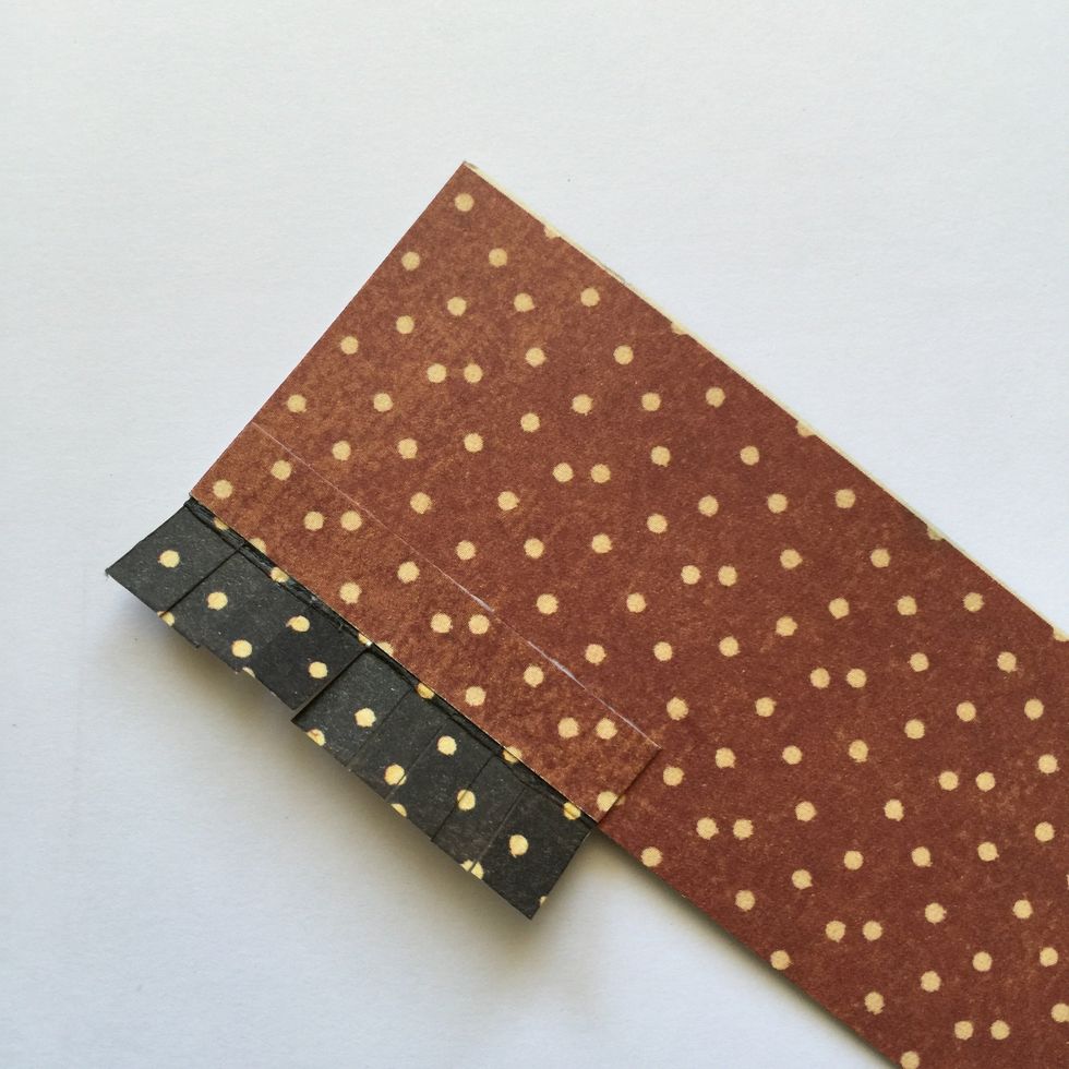 Glue them on the large piece back.