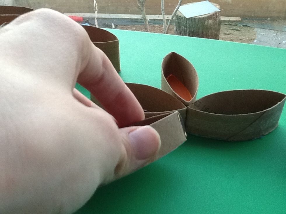 Glue them together like a four petal flower