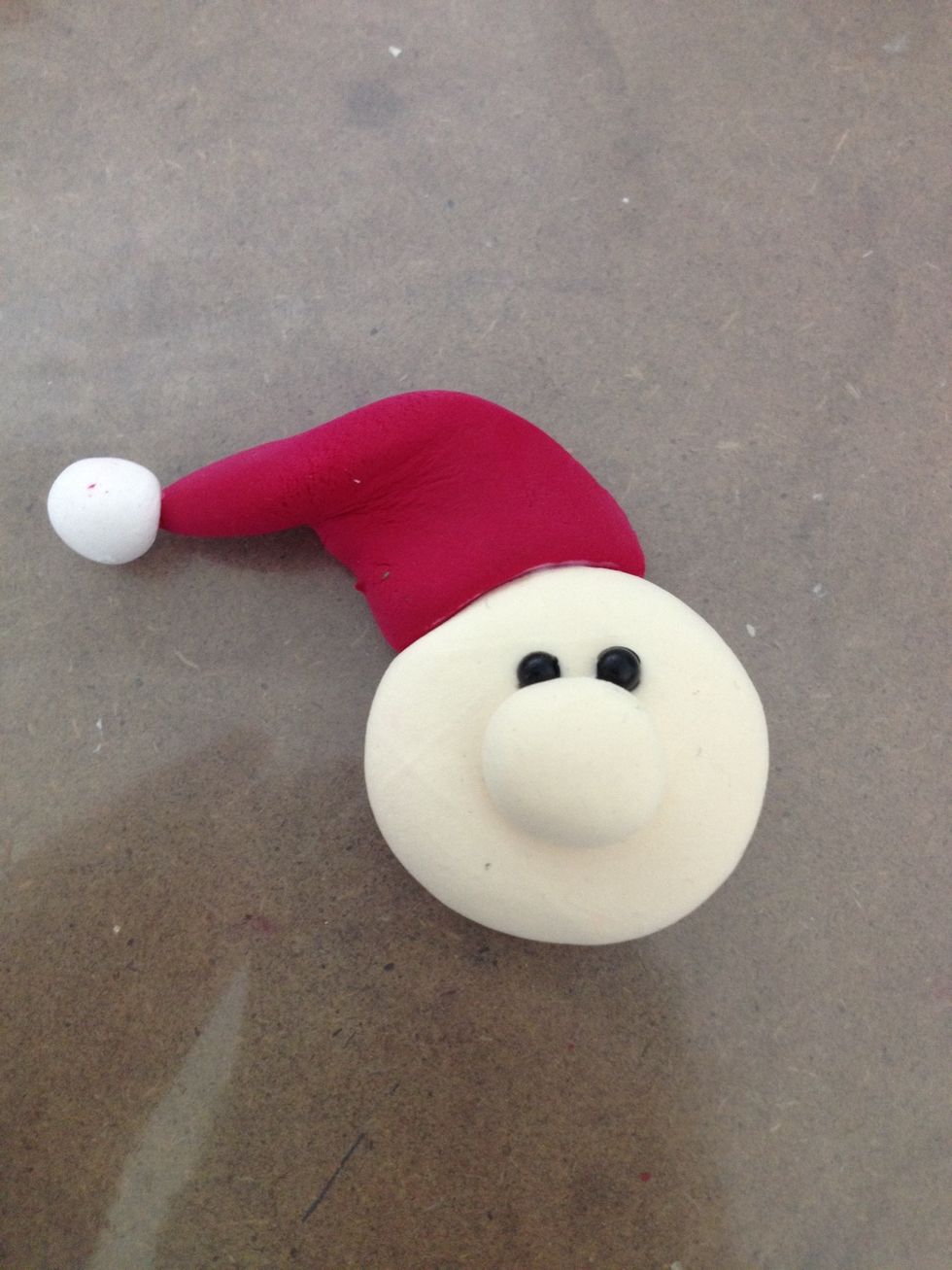 Glue them together to become the Santa hat.