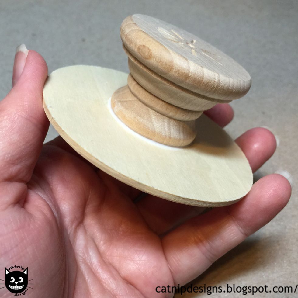 Glue to the center of the 3" Round Wooden Base.