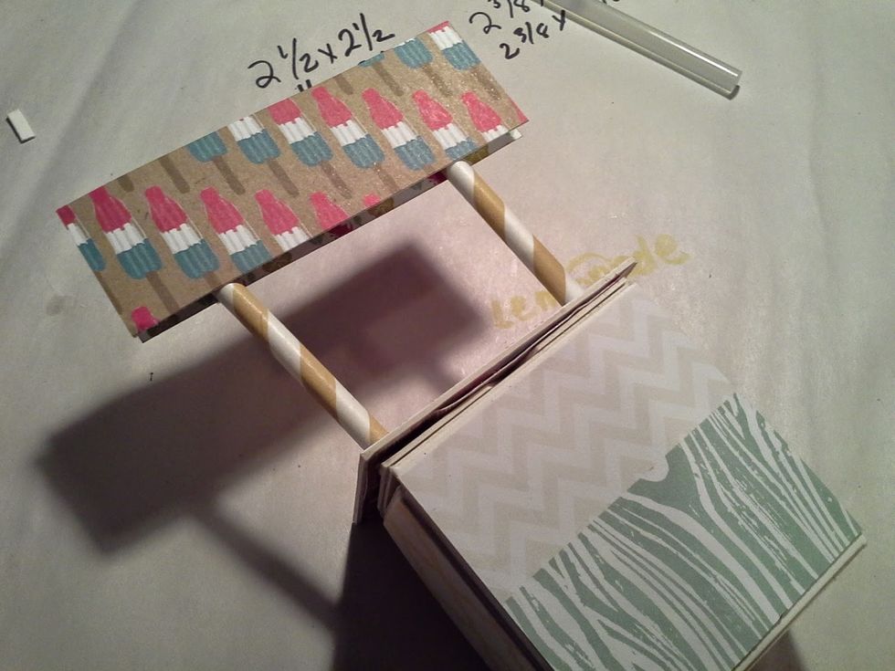 Glue to the top end of the straws and back with the other piece of cardstock.