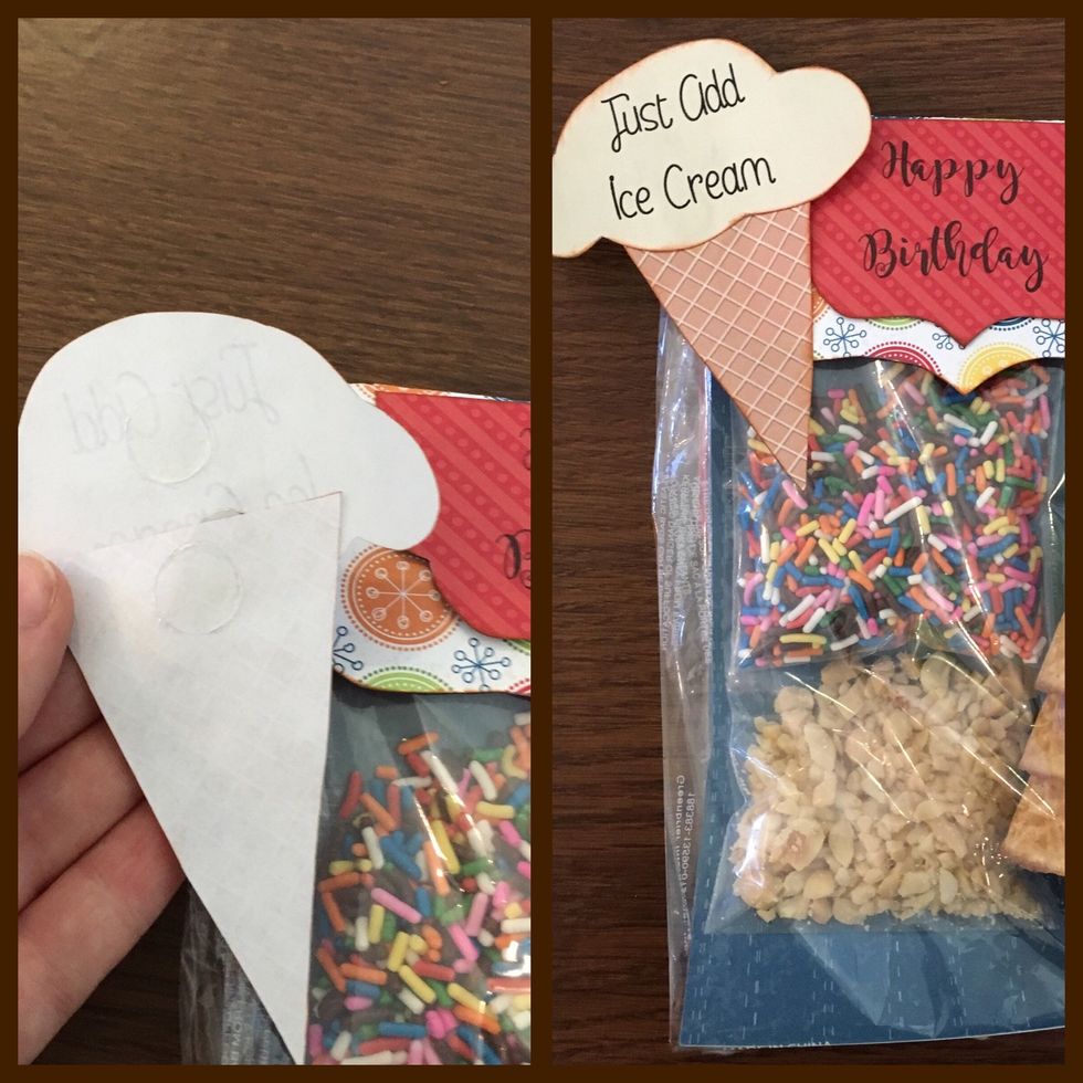 Glue together with a glue dot and glue to the bracket on the gift bag.