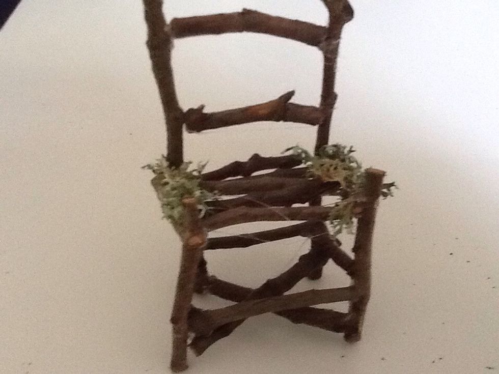 Glue you half inch long twigs above the front legs.