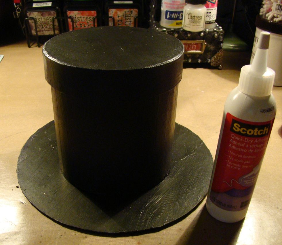 Glue your box to the top of your circle.