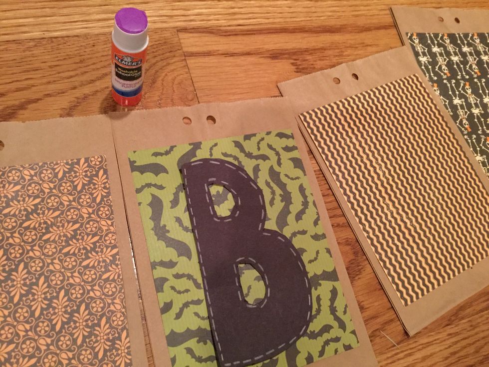 Glue your letters to your bags. (You should have two bags without letters)