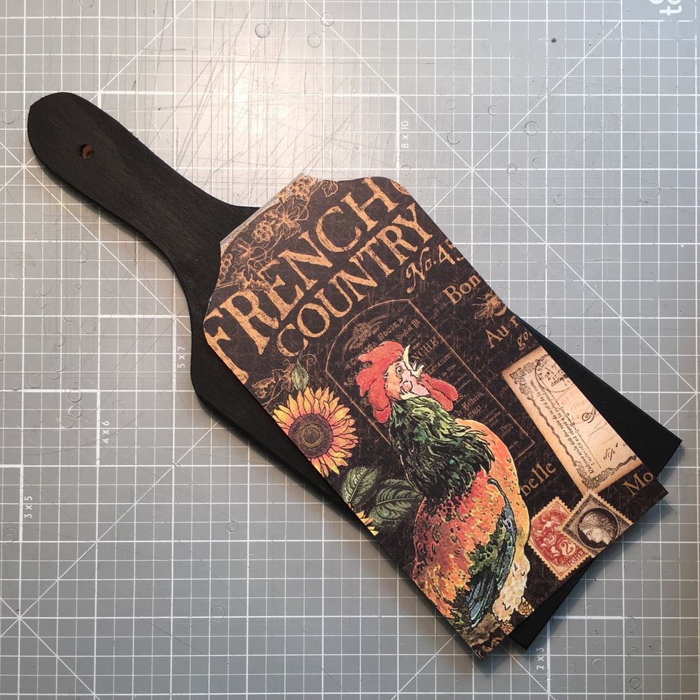 Glue your paper to the board.