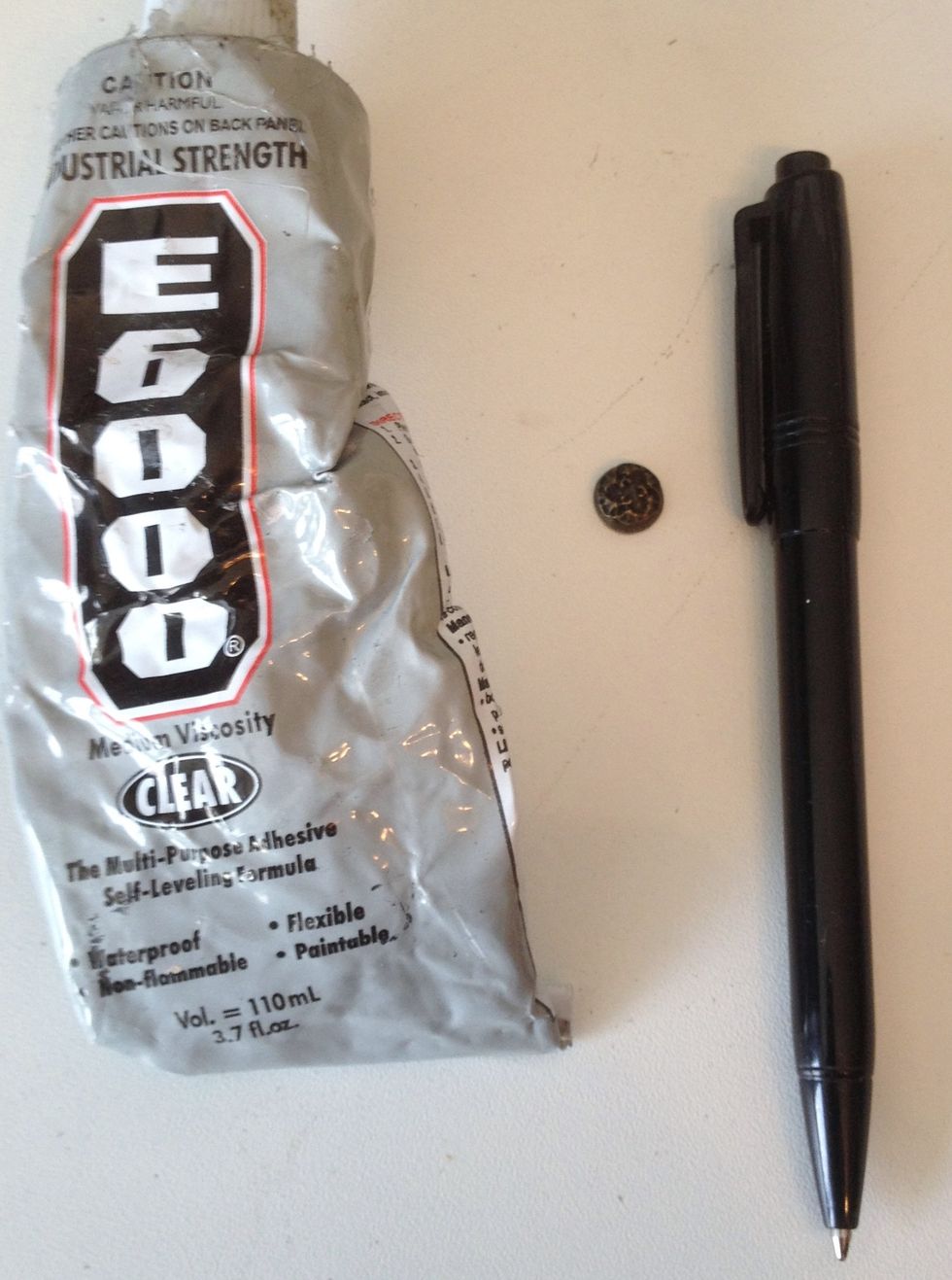 Glued on metal brads on the top Used E 6000 strong glue