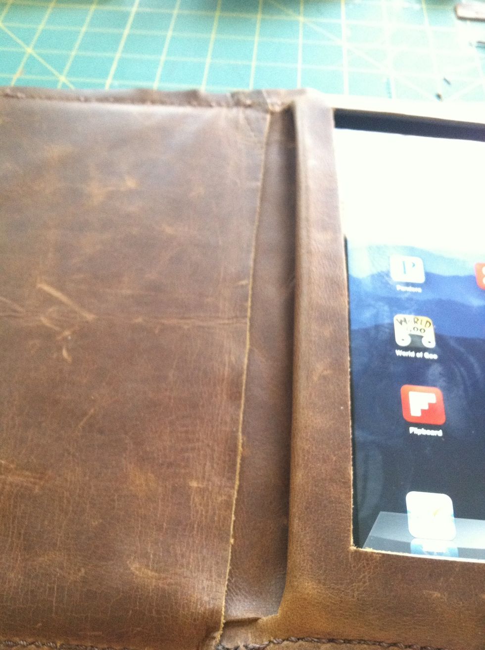 Go ahead and add some leather over the inside of the spine. This adds a nice finish. I just inserted it between the flap & the iPad. You could also sew it into the spine.