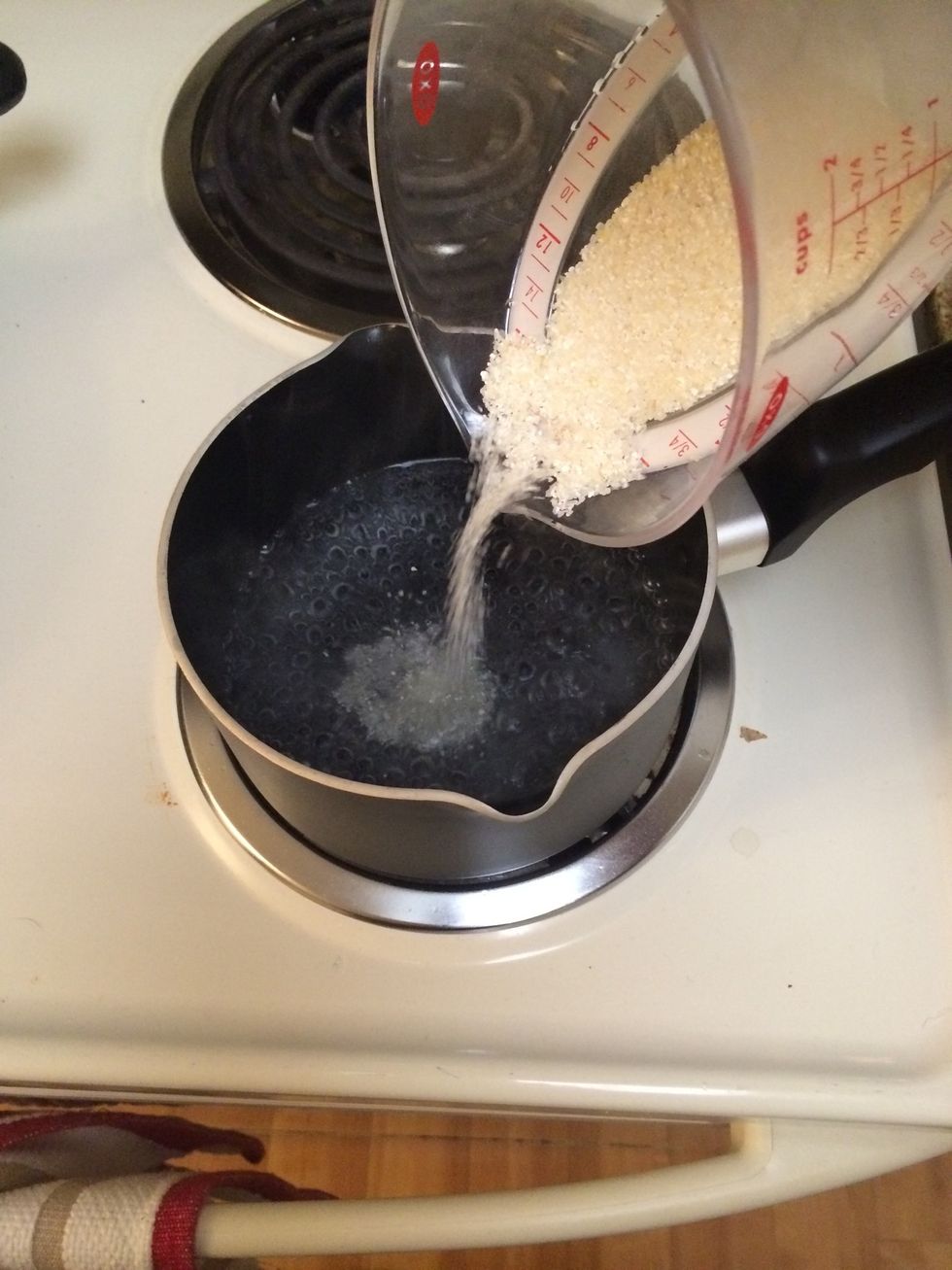 Go ahead and add the grits. Stir and turn to low and cover