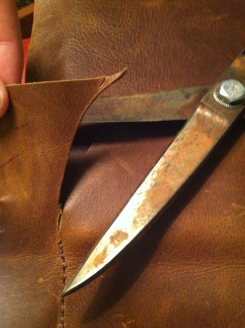 Go ahead and cut out the flap. Make sure you don't get too close to your stitch line. I got a little close.