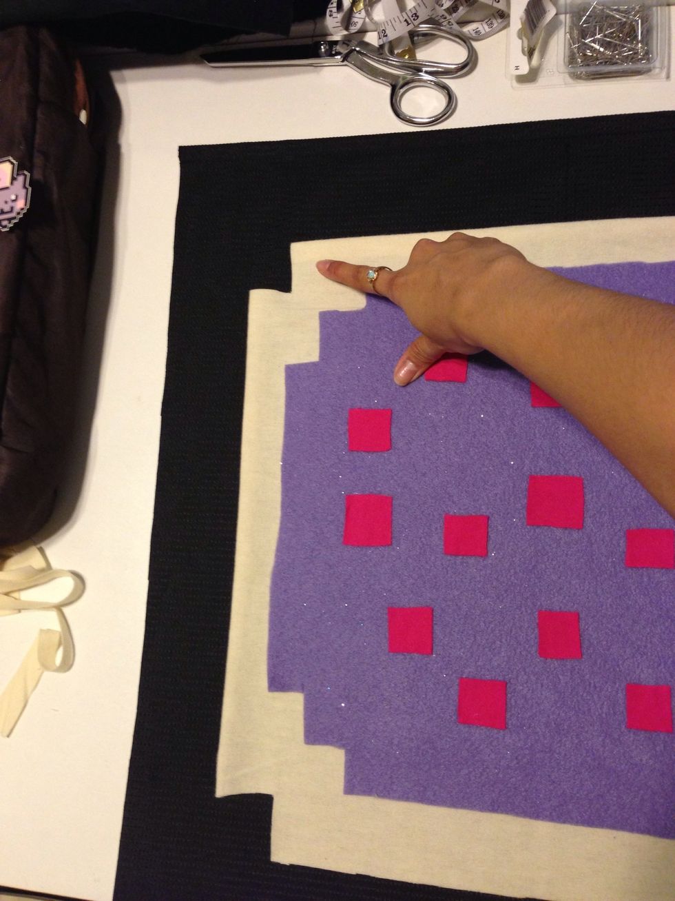 Go ahead and lay ur poptart down on top of the black. Now it's up to u how big or how poofy u want ur back to be. Im doing about 2 1/2 in all the way around.