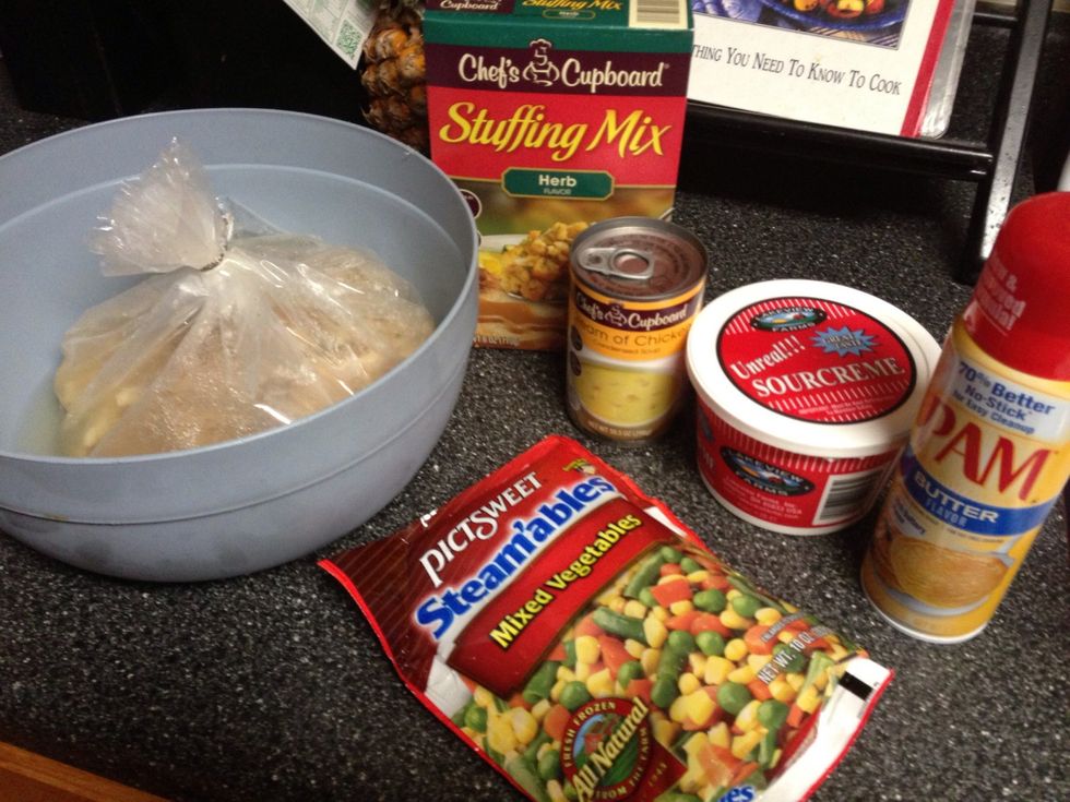 Go ahead & prepare stuffing mix as directed on the package. Thaw frozen veges. Preheat oven to 400 degrees.